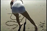 White chick vs Black Snake on the beach