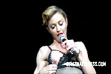 Celeb madonna flashing her bare breasts onstage during concert