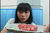 Food - Japanese girl eats cummy something