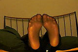 Worship feet in black pantyhose