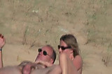 Wife and her hubby nude on the beach