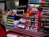 Black storeclerk girl gives blowjob to white guy