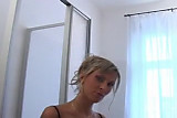 Sexy mature lady with big tits takes a shower