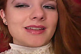 Horny redhead masturbates her pussy close-up